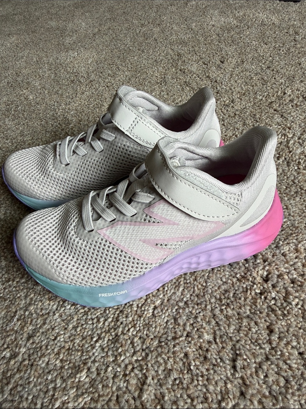 New Balance White Kids Sneakers with Pastel Pink, Purple & Blue Accents